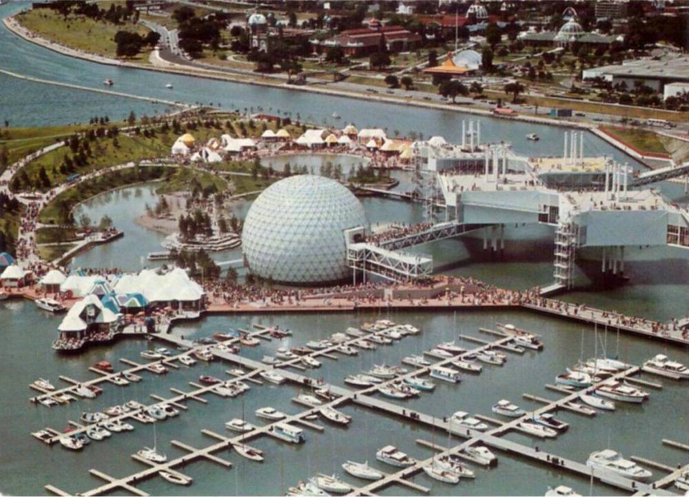 POSTCARD - TORONTO - ONTARIO PLACE - A PROVINCIAL GOVERNMENT-BUILT AMUSEMENT AREA - AERIAL PANORAMA LOOKING W - MARINA FEATURED AT BOTTOM - BIG DOME IS THE CINESPHERE - 1972